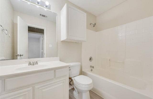 1405 Teal Way, Midlothian, TX 76065 White vanity with integrated sink, chrome faucet, wall-mounted mirror, and overhead cabinet