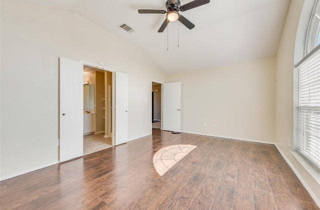 1405 Teal Way, Midlothian, TX 76065 Vaulted ceiling, wood-finish flooring, arched window with blinds, ceiling fan, and double doors