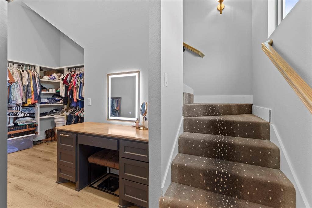 23180 Bridle View Drive, Lindale, TX 75771 Custom built-in closet system with shelving and hanging rods