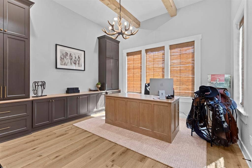 23180 Bridle View Drive, Lindale, TX 75771 Vaulted ceiling with exposed wood beams and chandelier
