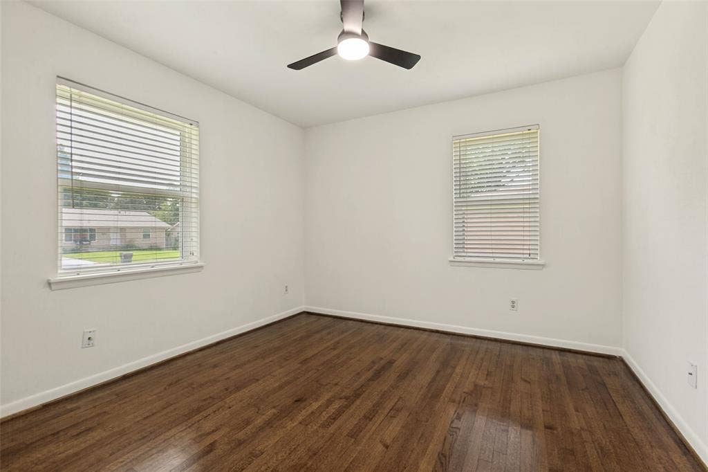 2413 Patricia Lane, Garland, TX 75041 Bedroom with views into front yard and side yard