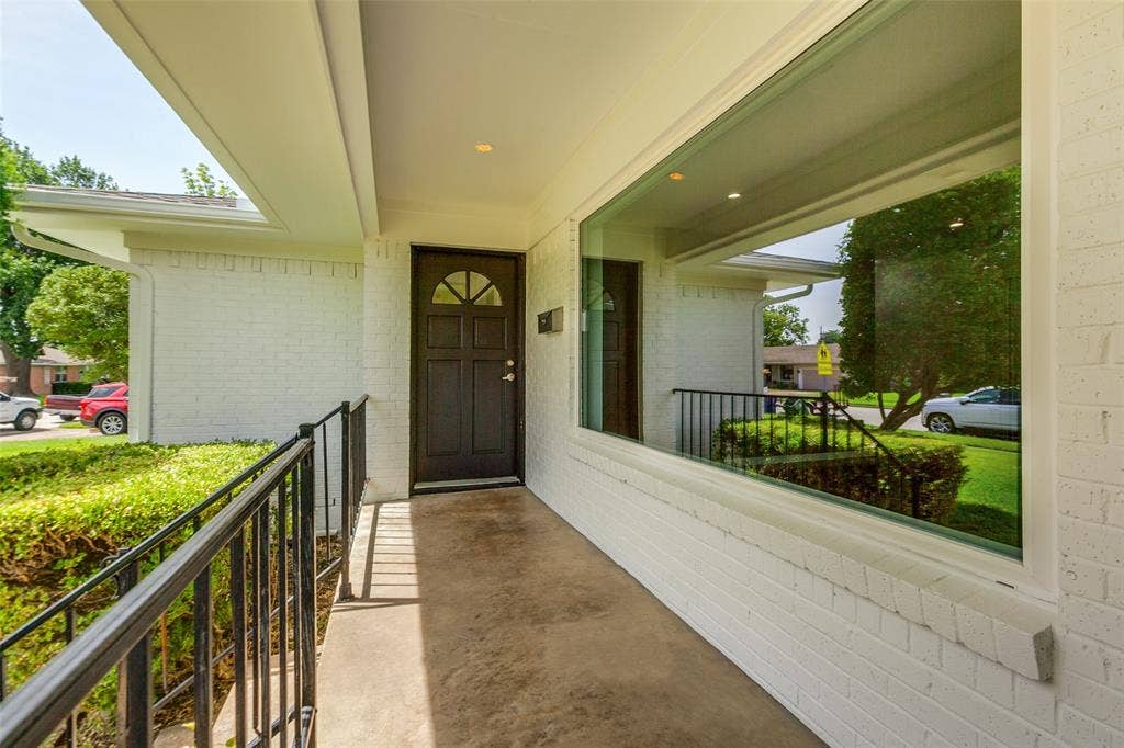 2413 Patricia Lane, Garland, TX 75041 Covered front porch and freshly painted front door