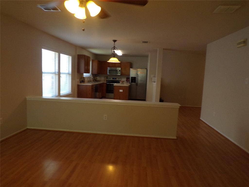2612 Sierra Drive, McKinney, TX 75071 View from living area into breakfast nook and kitchen