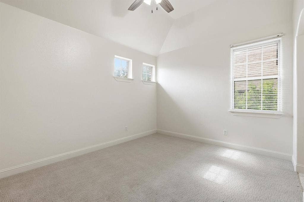 420 Silverado Trail, Keller, TX 76248 Vaulted ceiling, ceiling fan, multiple windows, window blinds, and light-colored carpeting
