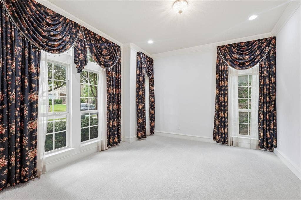 420 Silverado Trail, Keller, TX 76248 Carpeted room featuring multiple windows with traditional drapery, crown molding, and recessed lighting