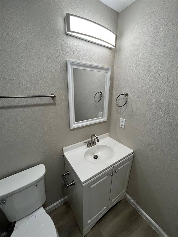 9615 Oak Gate Lane, Dallas, TX 75217 White vanity with a single basin sink and brushed nickel faucet