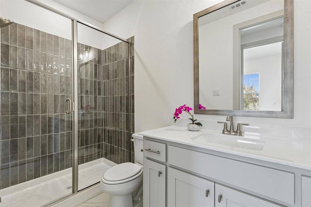 1825 Vetiver Glow Drive, Celina, TX 75009 Friends and family will love the beautiful guest baths in this lovely home.
