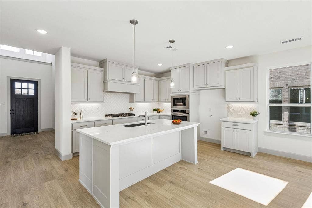 1825 Vetiver Glow Drive, Celina, TX 75009 Style and sophistication abound in this dream kitchen!