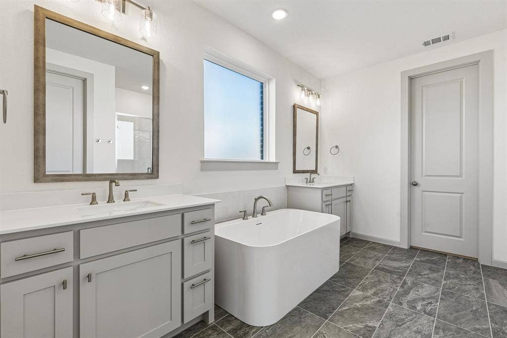 1825 Vetiver Glow Drive, Celina, TX 75009 Plenty of space for two in this wonderful owner's bath.