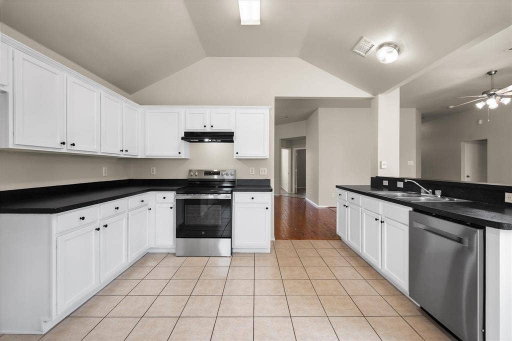 1017 Caleb Street, Burleson, TX 76028 Plenty of cabinets and counter space in this kitchen