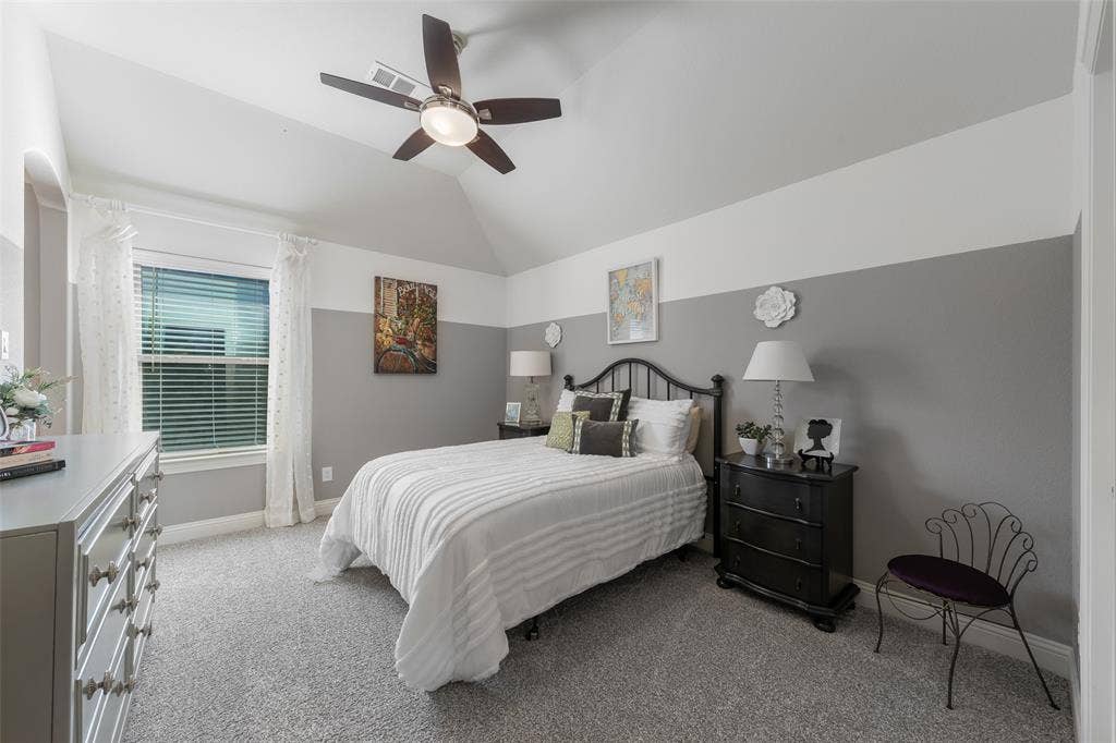 121 Lantana Lane, Wylie, TX 75098 Vaulted ceiling with a ceiling fan, carpeted flooring, and a window with blinds