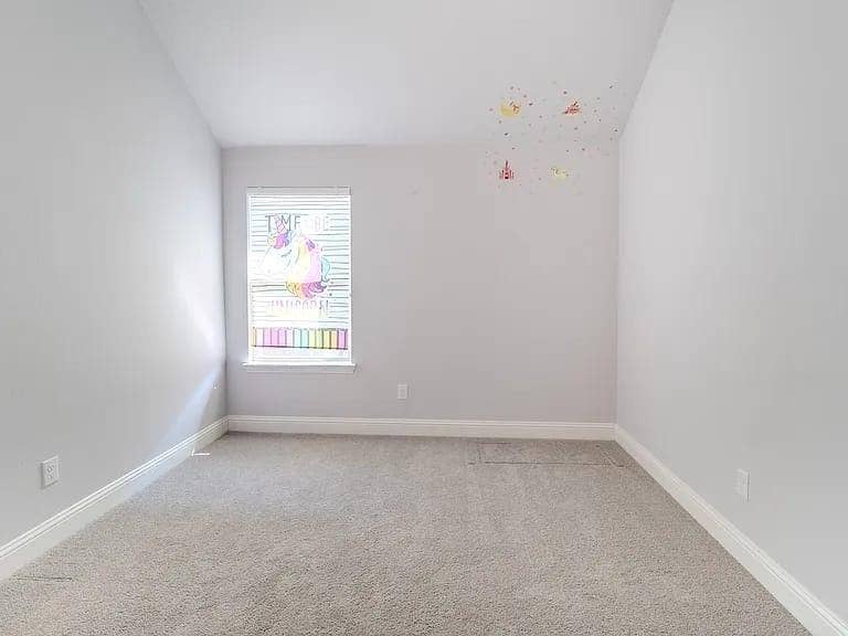 Neutral paint colors with wall-to-wall carpeting and white trim