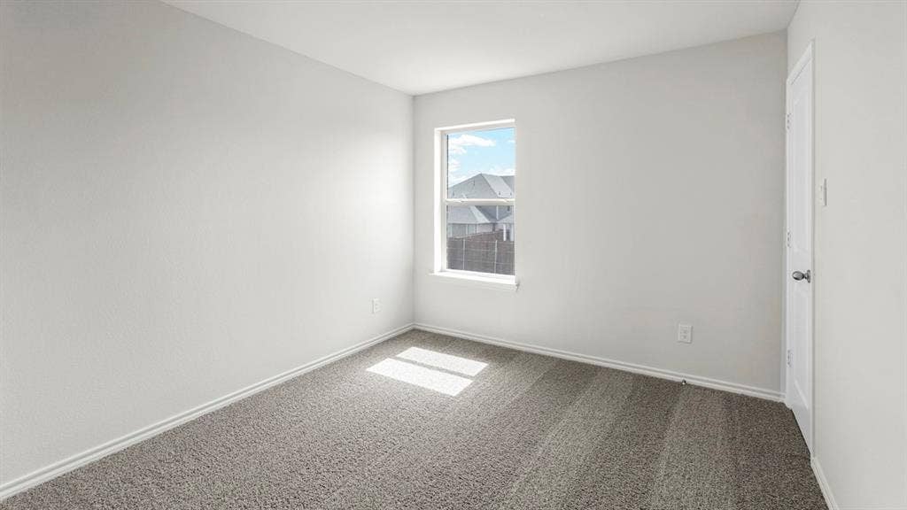 5610 Gannet Place, Crandall, TX 75114 Neutral-toned room featuring a single window, light gray carpeting, and white trim