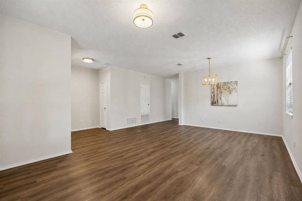 Open, Airy & Easy to Arrange – The spacious front living and formal dining areas connect naturally while still offering enough definition to create two distinct spaces, all unified by continuous LVP flooring.