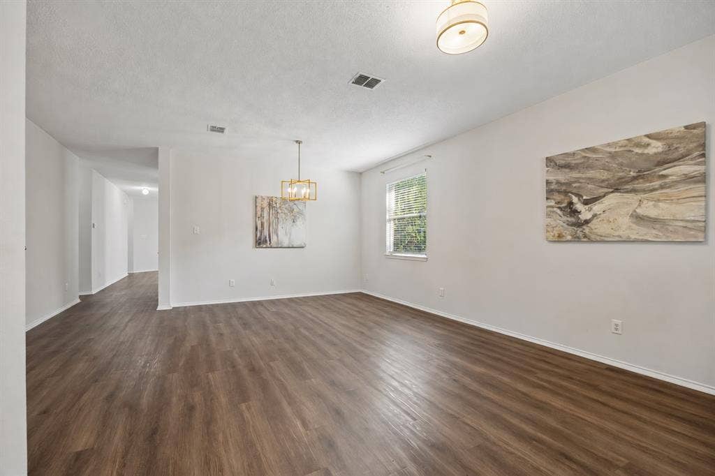 Flexible Formals with Room to Use Your Way – Generous front living and dining spaces provide plenty of room for entertaining, holiday gatherings, a second conversation area, or other flexible uses.