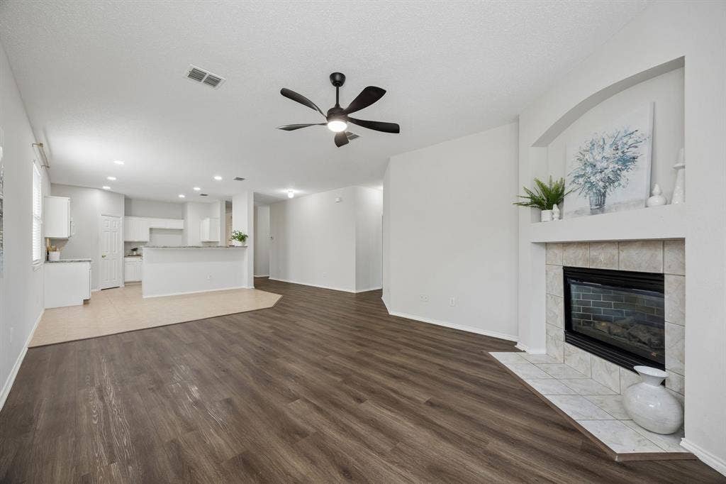 Connected Living with the Kitchen Close By – This angle highlights how easily the family room flows into the kitchen and casual dining area, creating a layout that keeps cooking, conversation, and everyday life connected.