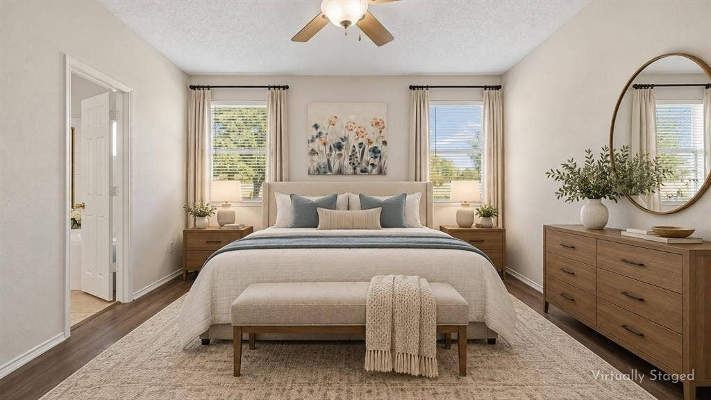 Space to Create a True Bedroom Retreat – Two windows bring natural light into the spacious primary suite, while a broad wall layout provides ample room for a substantial bed, additional furnishings, or a comfortable sitting area.