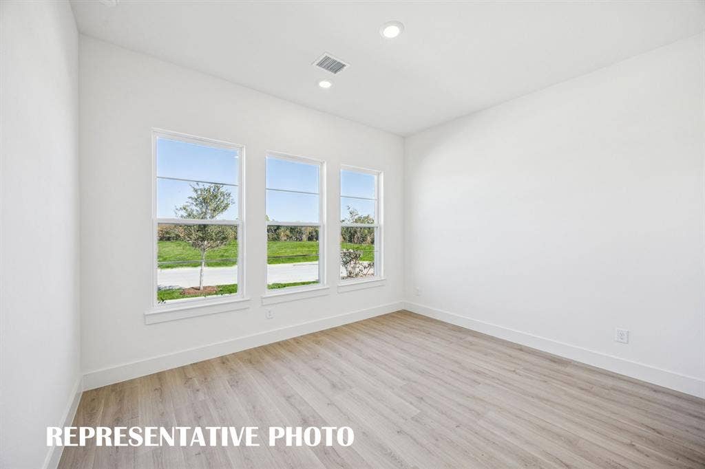 1809 Vetiver Glow Drive, Celina, TX 75009 You'll find nicely sized secondary bedrooms in our Percy floor plan. REPRESENTATIVE PHOTO