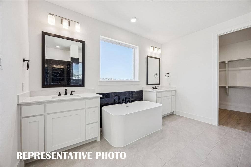 1809 Vetiver Glow Drive, Celina, TX 75009 Ample room for two in this wonderful owner's bath! REPRESENTATIVE PHOTO
