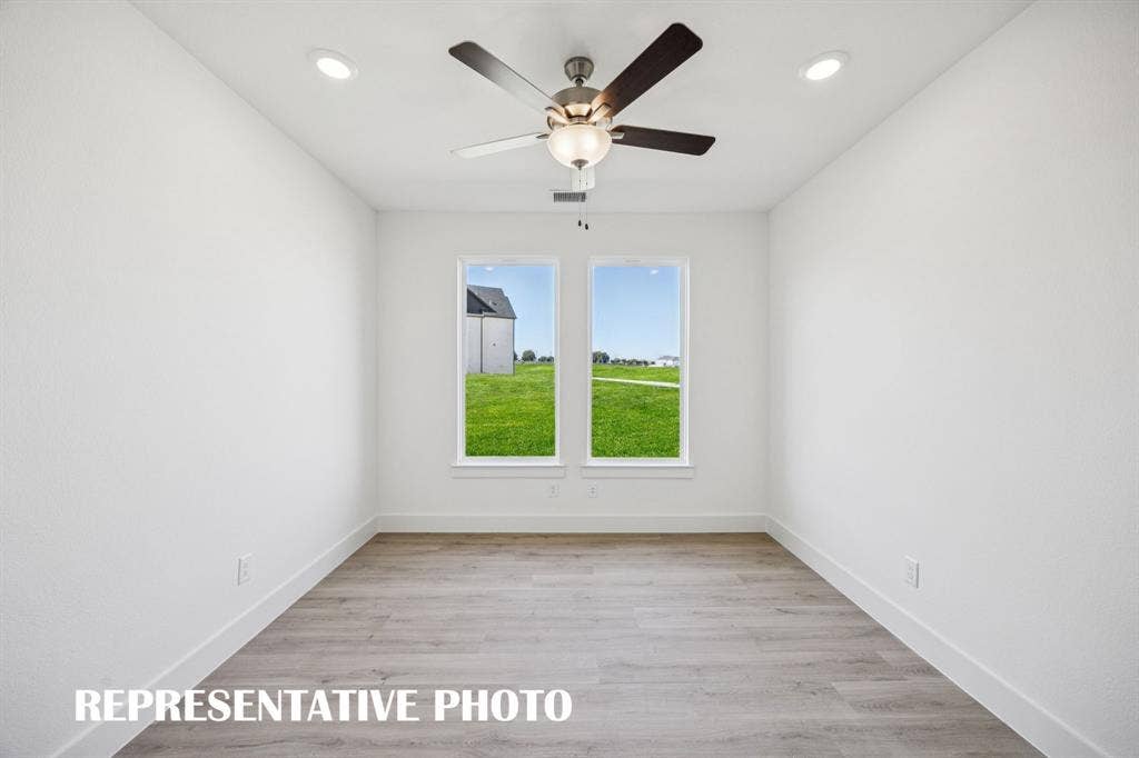 1809 Vetiver Glow Drive, Celina, TX 75009 The professional working from home will appreciate the privacy this main floor home office provides. REPRESENTATIVE PHOTO