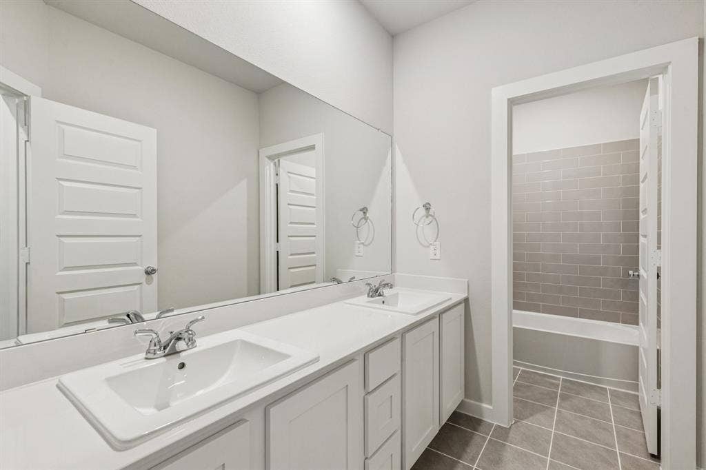 Bathroom in the Winters home plan by Trophy Signature Homes – REPRESENTATIVE PHOTO