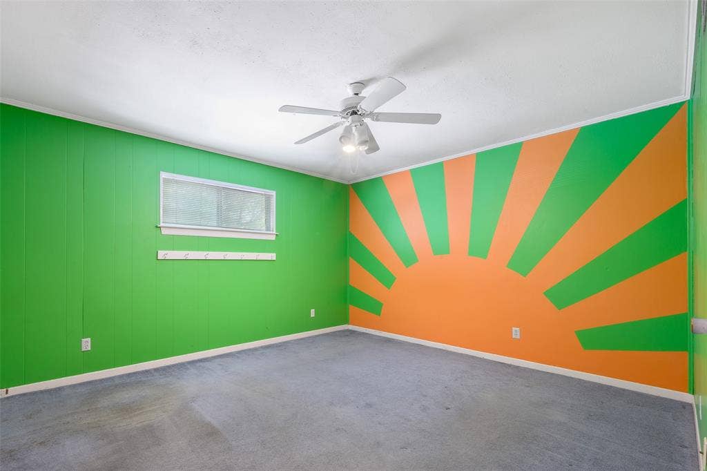 635 Sherrill Boulevard, Duncanville, TX 75116 Recessed window, ceiling fan, and paneled accent wall