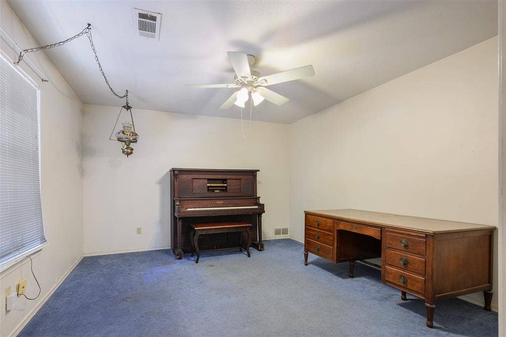 635 Sherrill Boulevard, Duncanville, TX 75116 Angled ceiling, ceiling fan, wall-to-wall carpeting, window with blinds