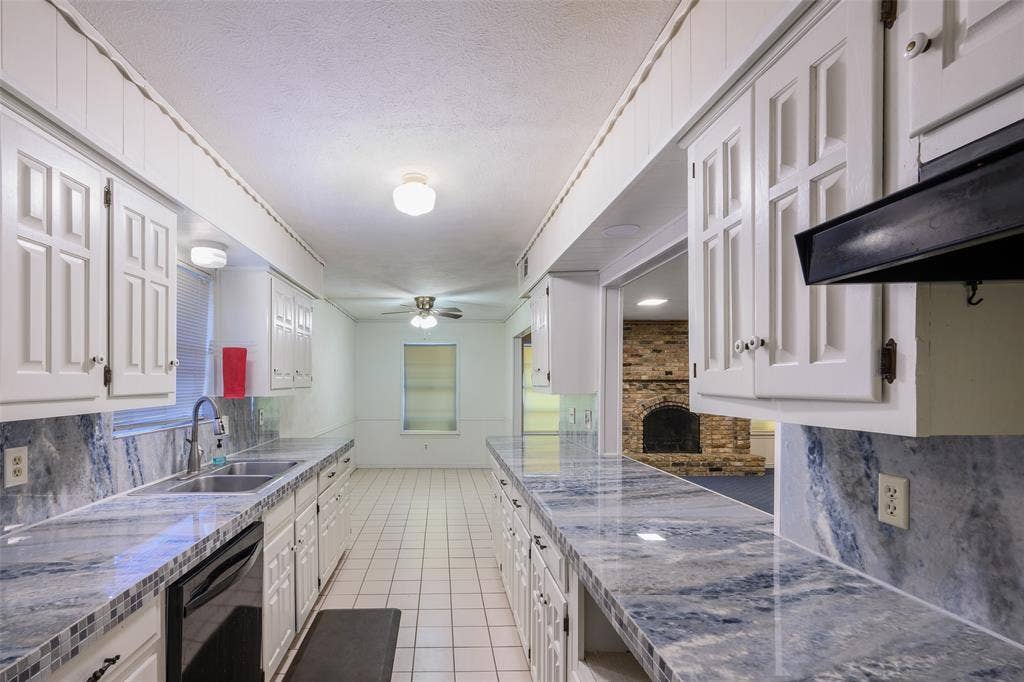 635 Sherrill Boulevard, Duncanville, TX 75116 White cabinetry with decorative paneling