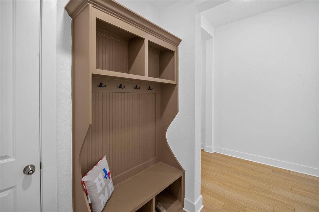 Built-in mudroom bench with cubbies and coat hooks