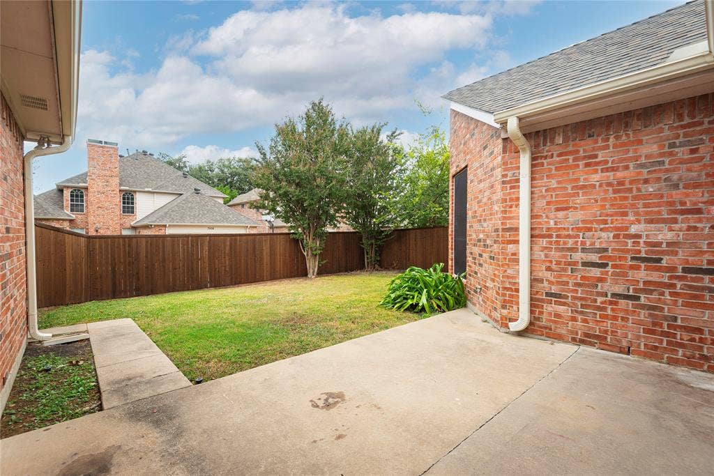 7829 Case Drive, Plano, TX 75025 View of yard featuring a patio area