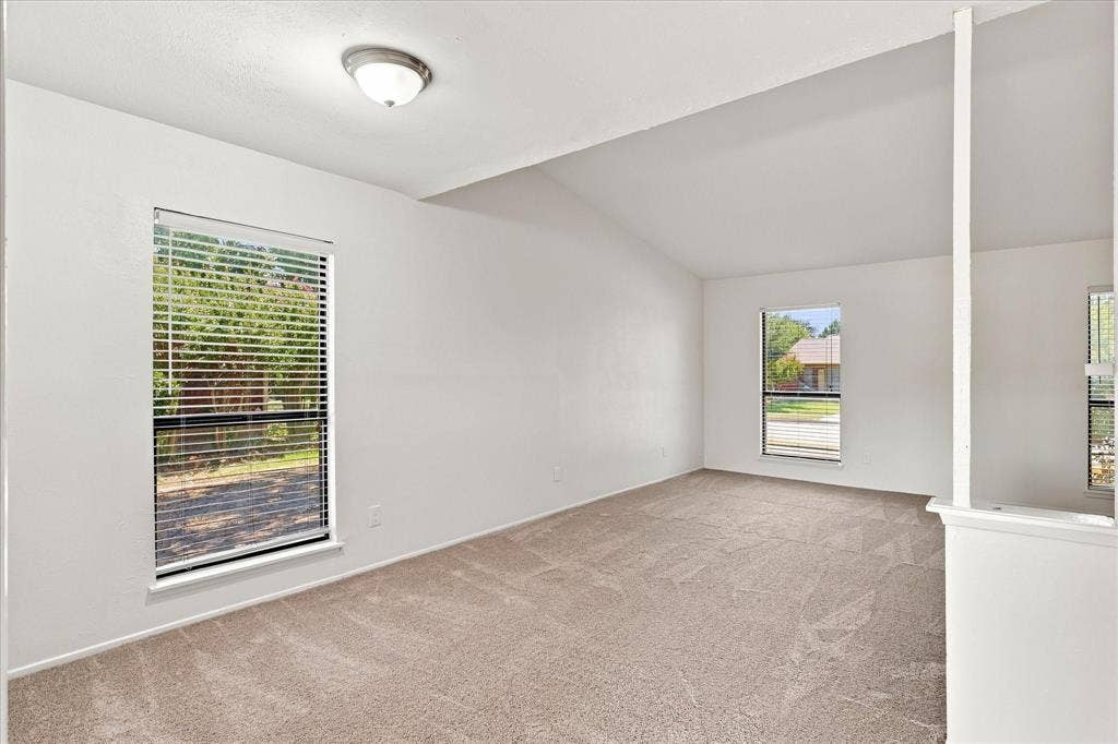 411 Clear Creek Lane, Coppell, TX 75019 Dining room opens to large front living area - perfect for entertaining
