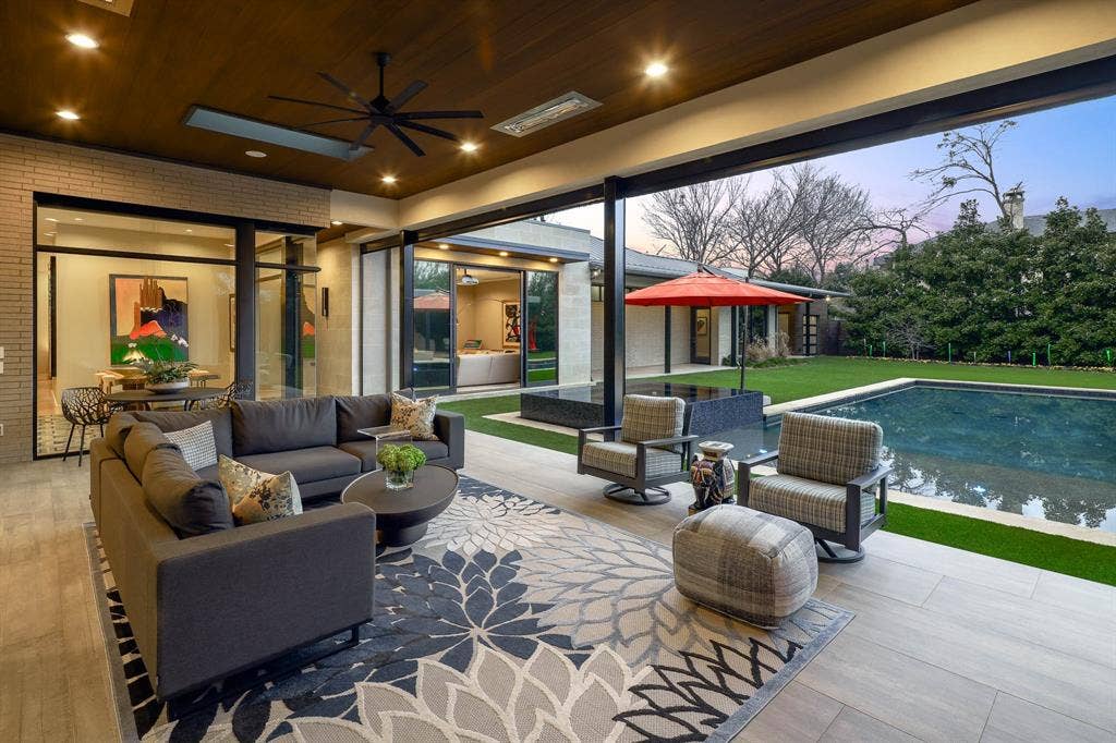 4745 Crooked Lane, Dallas, TX 75229 Outdoor covered loggia with sitting area, gas fireplace, built-in heaters and Phantom screens