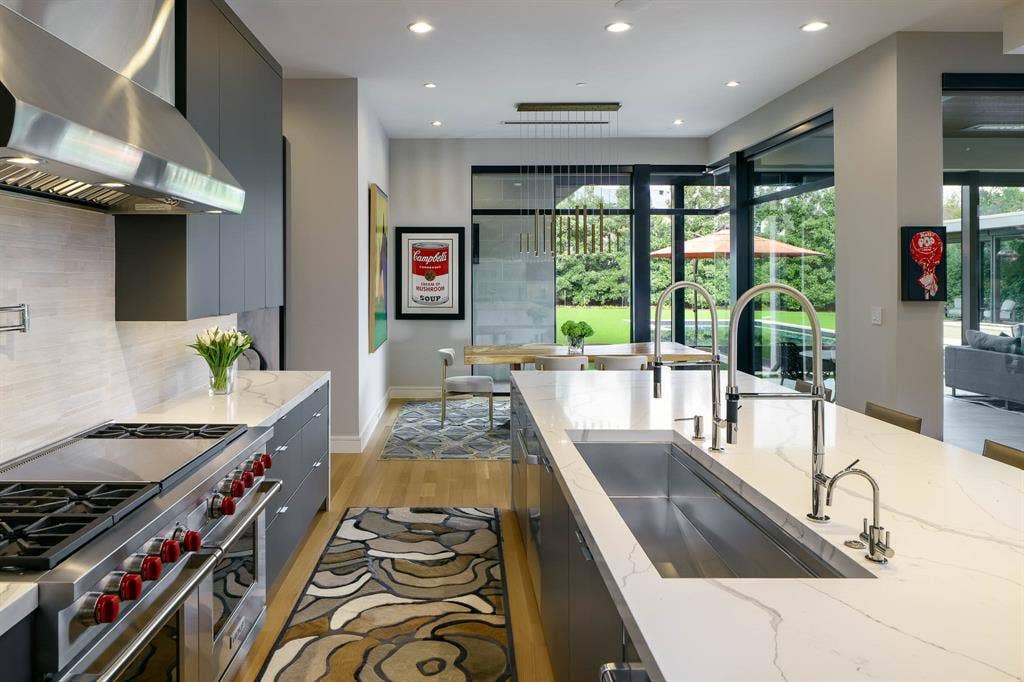 4745 Crooked Lane, Dallas, TX 75229 Gourmet kitchen with premium appliances and adjacent breakfast room