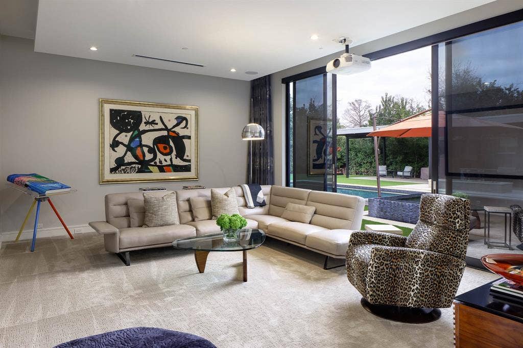 4745 Crooked Lane, Dallas, TX 75229 Media room with sliding doors to backyard and pool