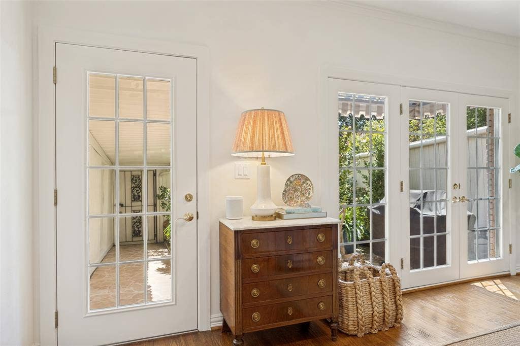 7526 W Northwest Highway, #5, Dallas, TX 75225 Back door leads to private patio and covered carport with two closets and two dedicated parking spots.