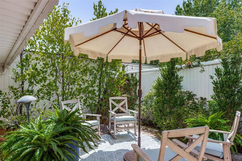 7526 W Northwest Highway, #5, Dallas, TX 75225 Beautiful landscaping provides privacy.