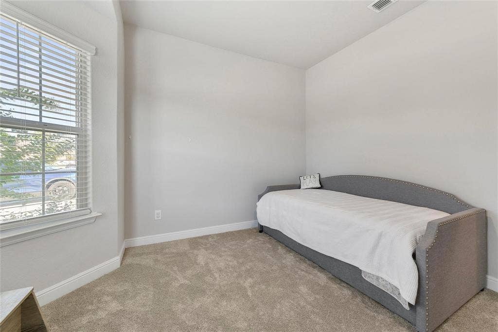 821 Shepperton Way, Fort Worth, TX 76247 View of carpeted bedroom