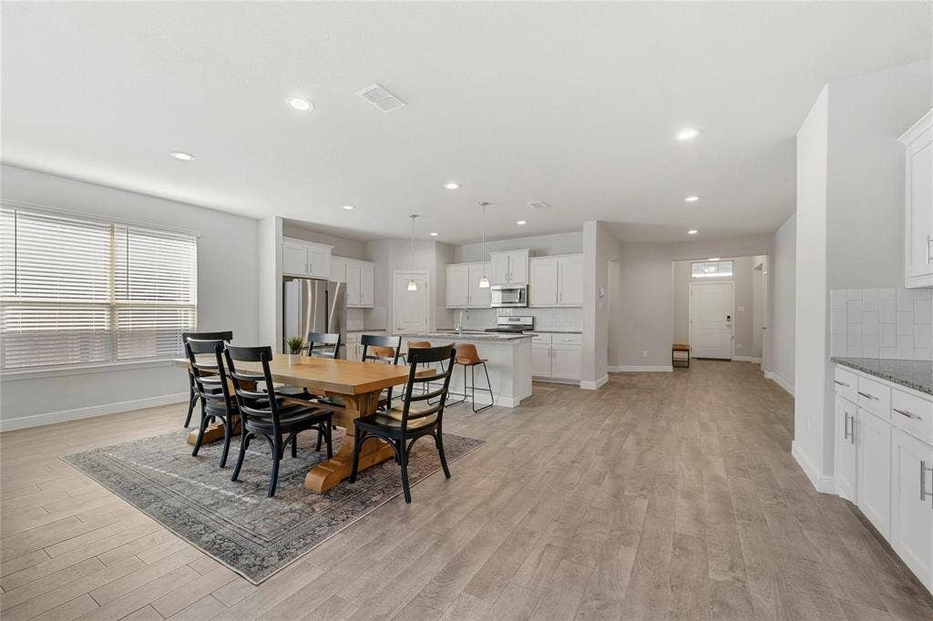 821 Shepperton Way, Fort Worth, TX 76247 Dining area featuring light hardwood / wood-style flooring