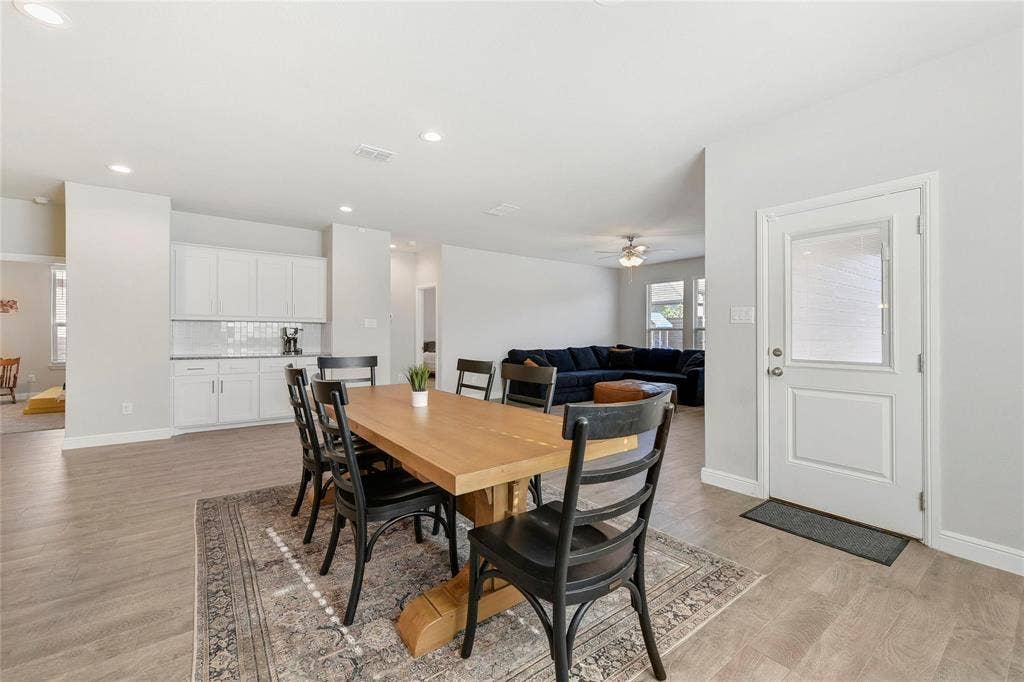 821 Shepperton Way, Fort Worth, TX 76247 Dining area featuring light hardwood / wood-style floors and ceiling fan
