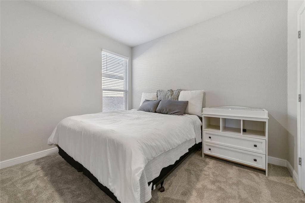 821 Shepperton Way, Fort Worth, TX 76247 View of carpeted bedroom