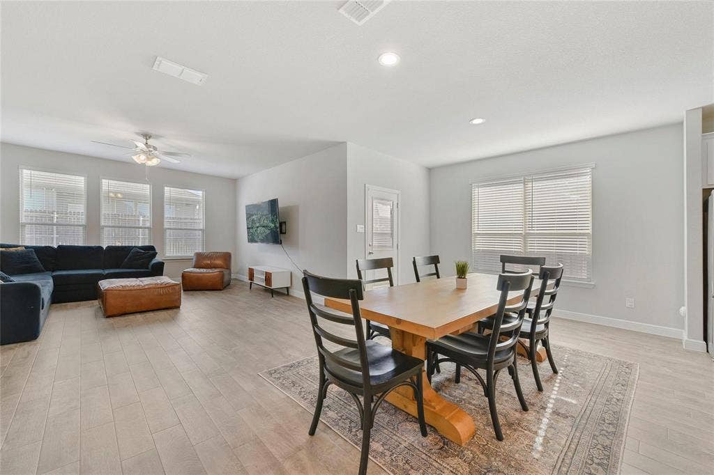 821 Shepperton Way, Fort Worth, TX 76247 Dining area featuring light hardwood / wood-style floors and ceiling fan