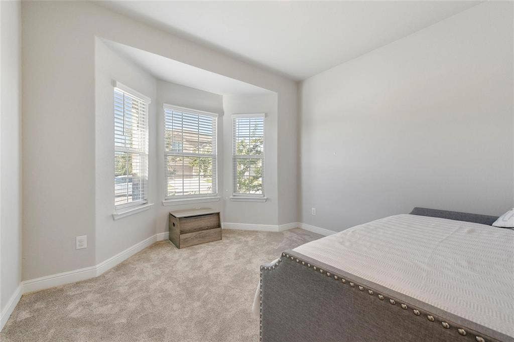 821 Shepperton Way, Fort Worth, TX 76247 View of carpeted bedroom