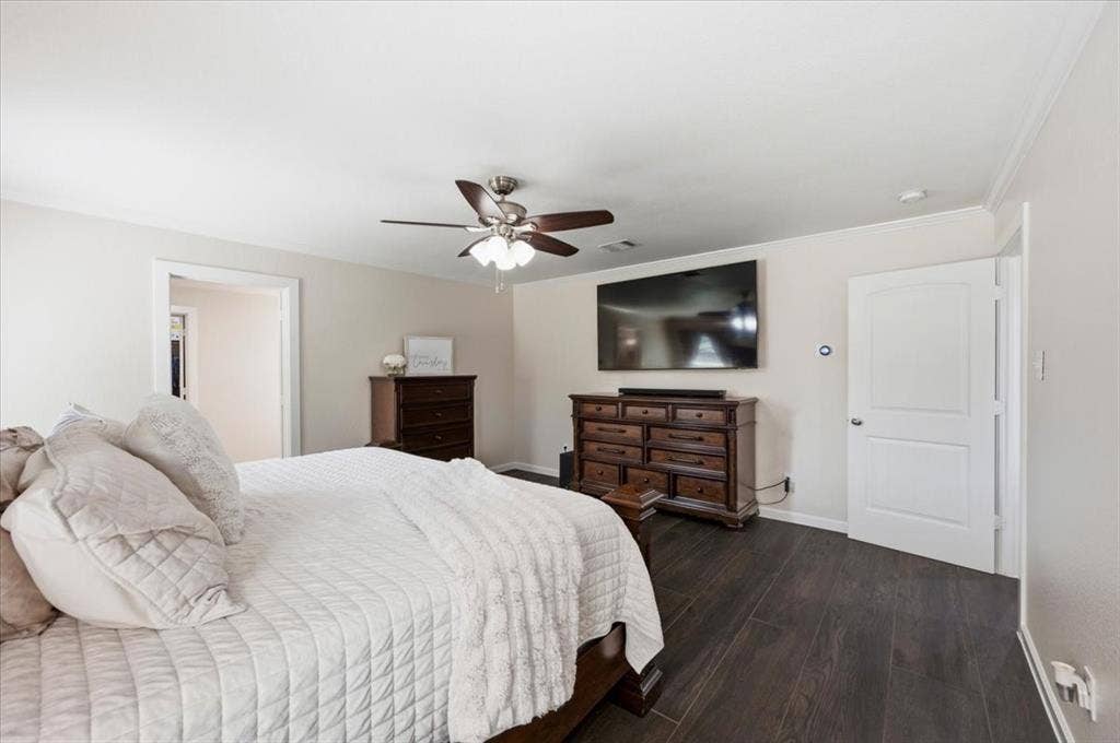 2225 Torch Lake Drive, Forney, TX 75126 Recessed lighting, crown molding, wood-finish flooring, ceiling fan with light fixture, and white interior doors