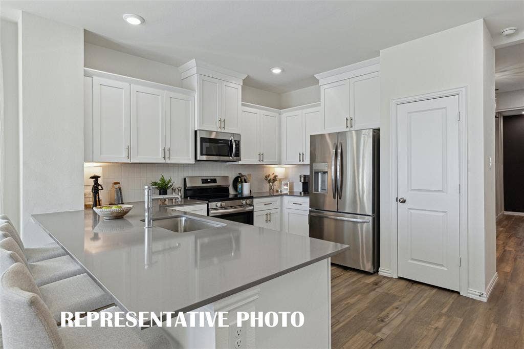5310 Springlake Parkway, Haltom City, TX 76117 With an abundance of style, counter space and storage, you can find the kitchen of your dreams in Heritage Village! REPRESENTATIVE PHOTO OF MODEL HOME.