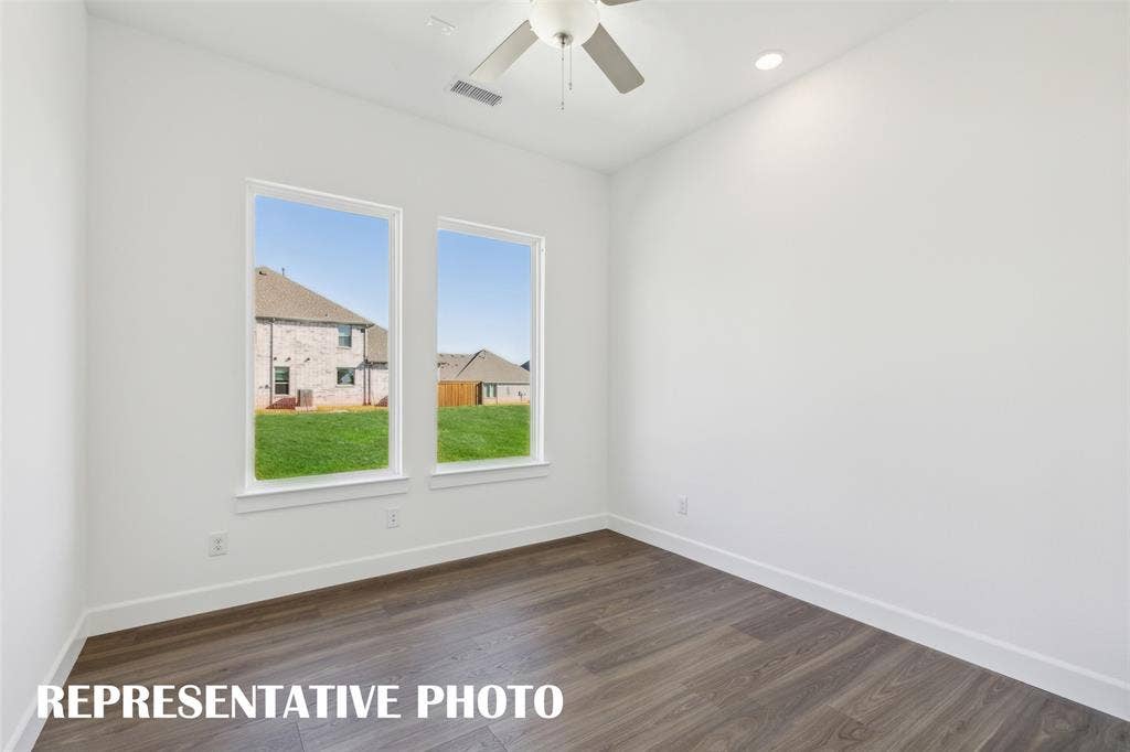 1805 Vetiver Glow Drive, Celina, TX 75009 The professional needing to work from home will appreciate this light filled, private home office. REPRESENTATIVE PHOTO