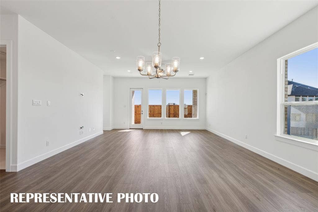 1805 Vetiver Glow Drive, Celina, TX 75009 Whether it's lively dinner parties or cozy family meals, this dining room is perfect for all occasions! REPRESENTATIVE PHOTO