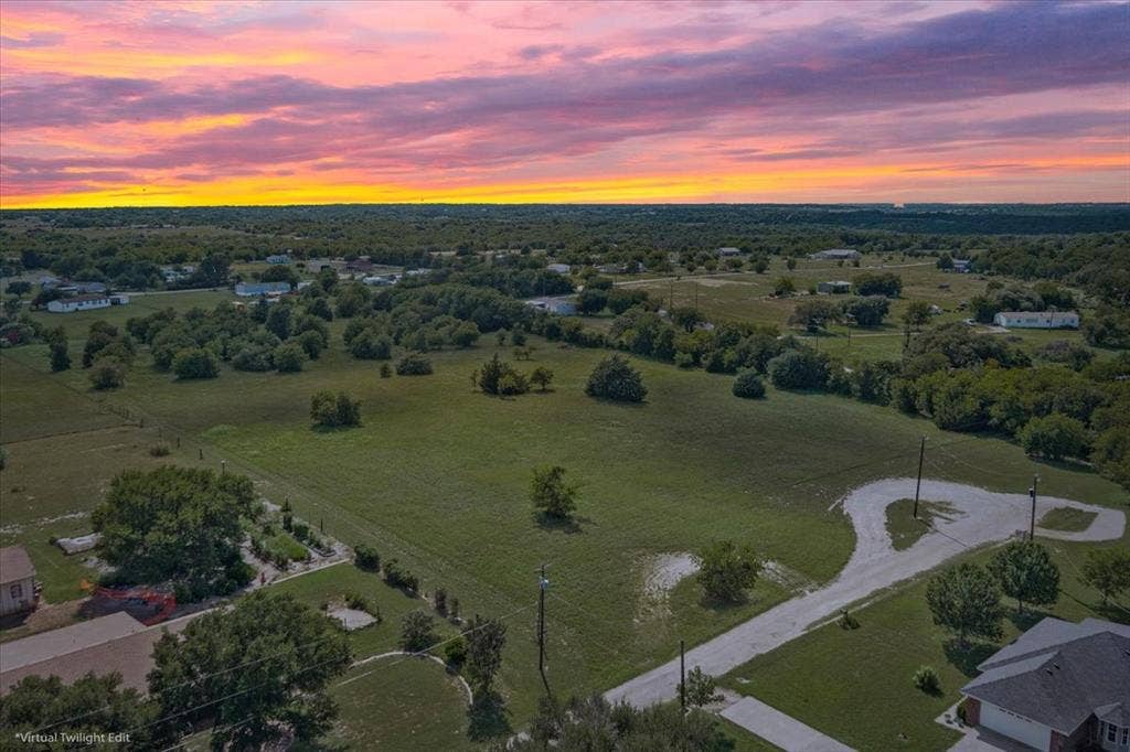 108 Brown Drive, Bruceville Eddy, TX 76524 Expansive green space with scattered mature trees and residential structures