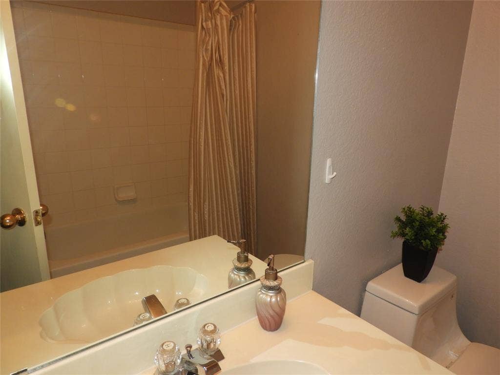 Primary Bathroom with double sinks, garden tub and standing shower.