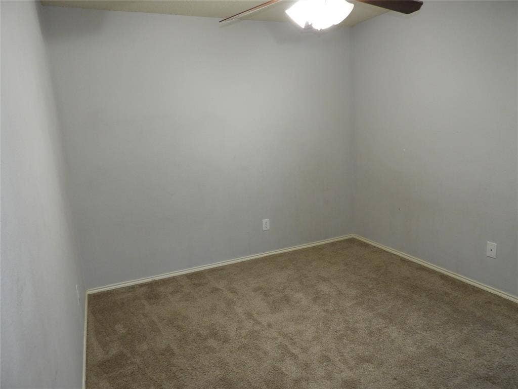 Bedroom #3 with ceiling fan.
