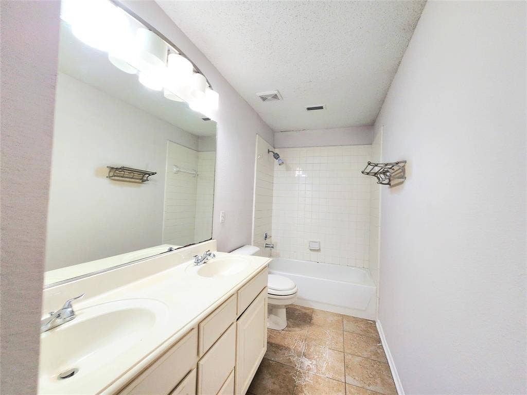 3625 Mason Drive, Plano, TX 75025 Dual vanity with integrated sinks and chrome faucets